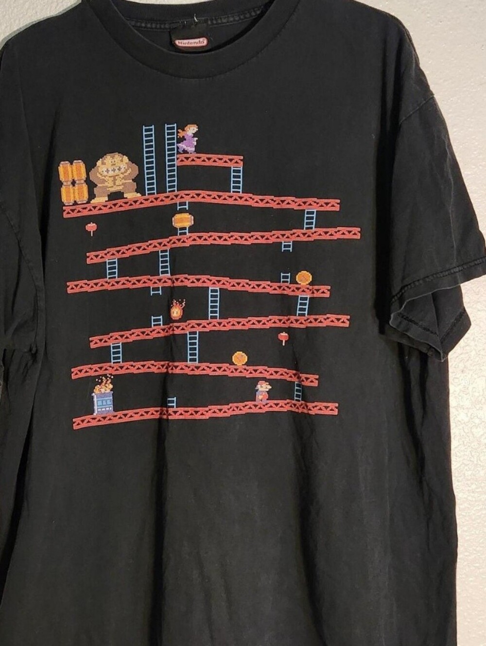 Nintendo Donkey Kong Black Tee with Red Platforms and Blue Ladders
